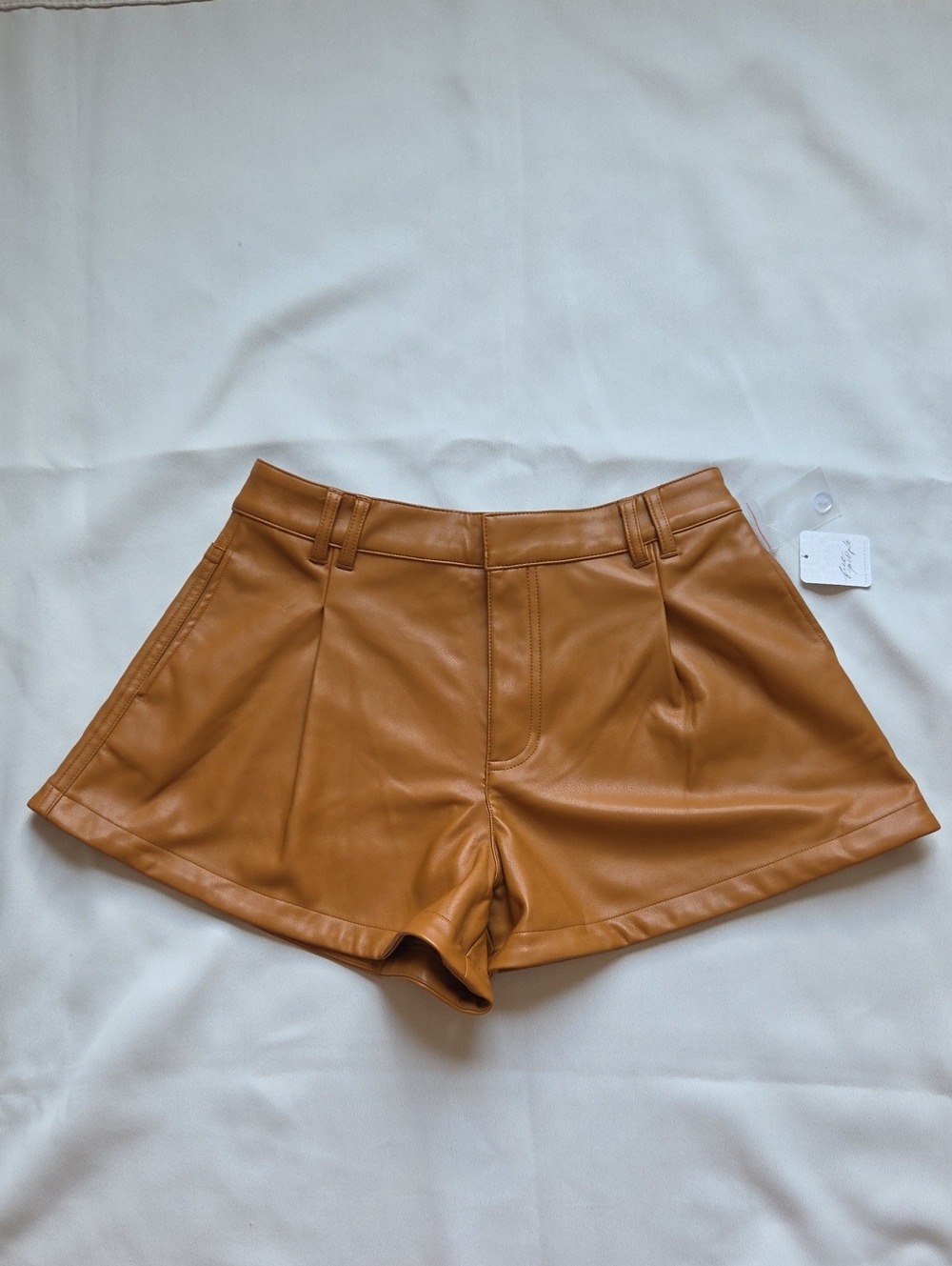 We The Free High-Waist Faux Leather Shorts in Caramel